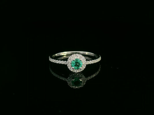 18K white gold emerald and diamond halo ring with 0.20ct round emerald and 0.28ct diamonds – Emirates Diamonds