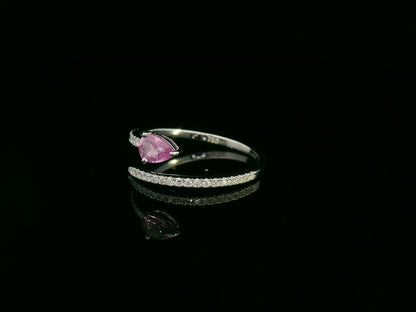 18K white gold open bypass ring with 0.39ct pear pink sapphire and 0.16ct pavé diamonds