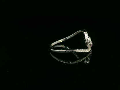 18K white gold bypass ring with pear-cut pink sapphire and diamond cluster