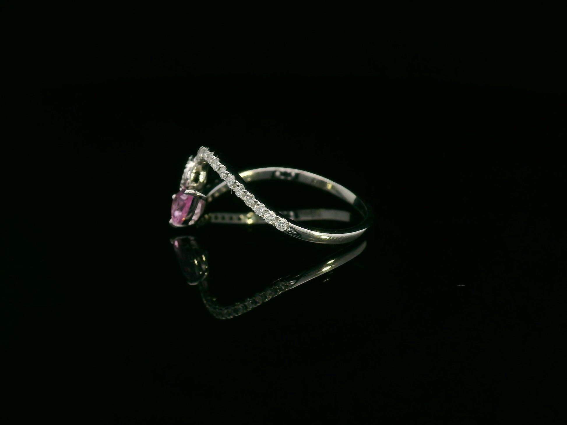 18K white gold bypass ring with pear-cut pink sapphire and diamond cluster