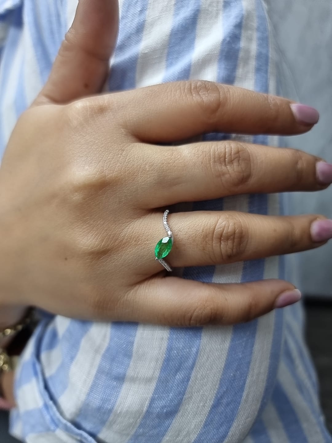 18K white gold emerald and diamond crossover ring with marquise-cut 0.65 carat emerald