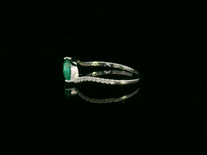 18K white gold emerald and diamond crossover ring with marquise-cut 0.65 carat emerald
