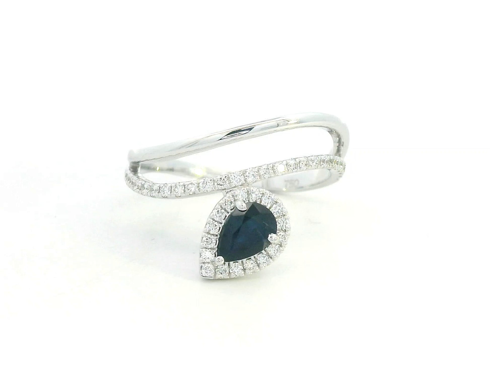 0.61 ct pear-cut blue sapphire and diamond halo ring in 18K white gold with double band design – Emirates Diamonds
