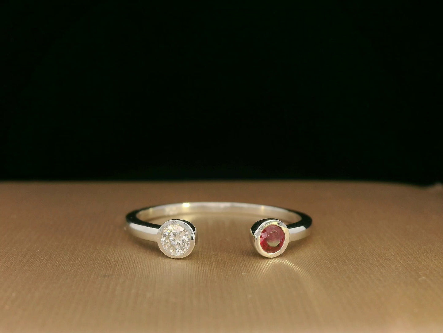 Ruby and diamond open ring in 18K white gold by Emirates Diamonds