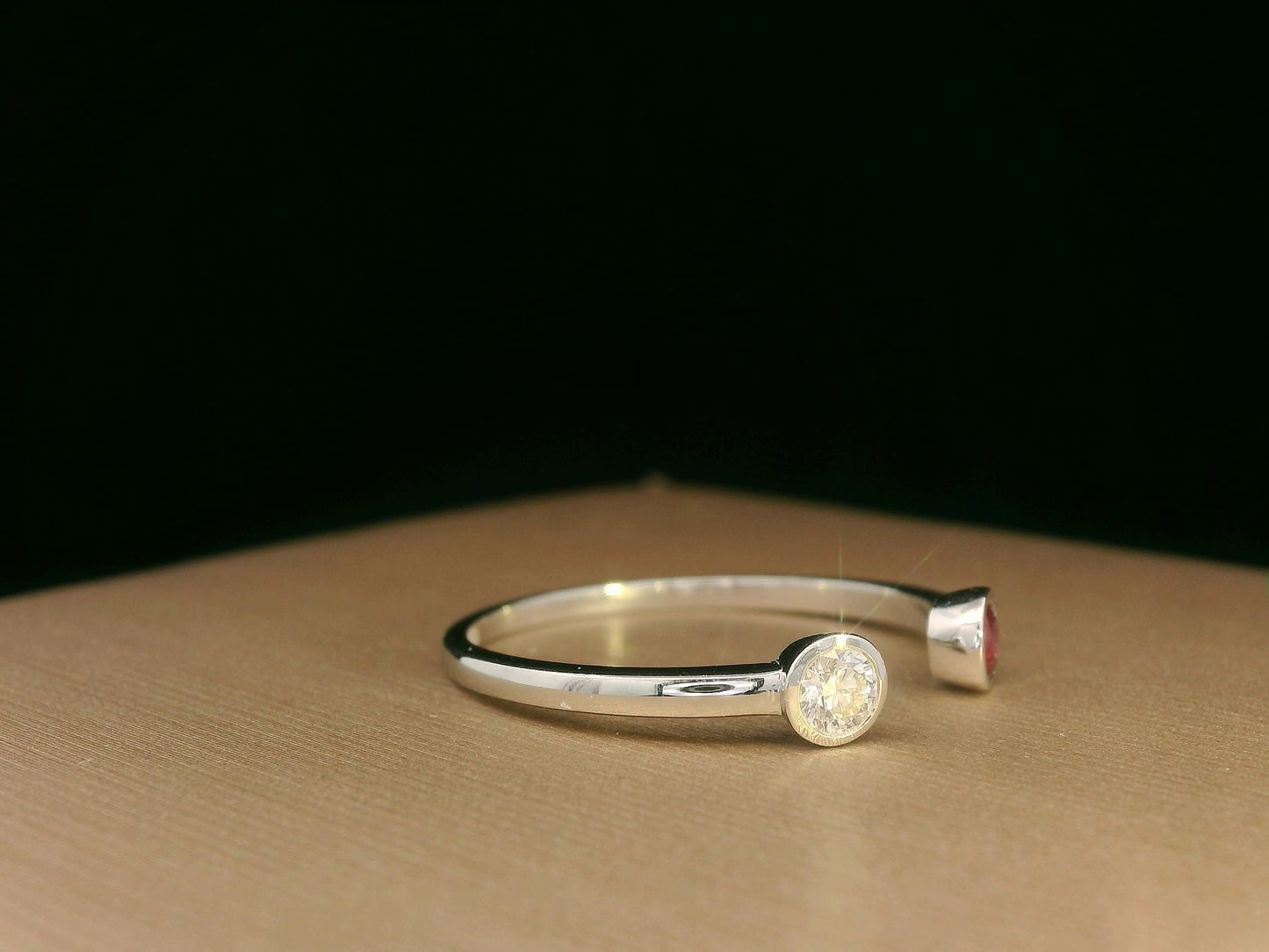 Ruby and diamond open ring in 18K white gold by Emirates Diamonds