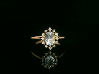 0.71 ct aquamarine and diamond halo ring in 18K rose gold with floral vintage-inspired design – Emirates Diamonds
