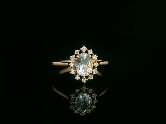 0.71 ct aquamarine and diamond halo ring in 18K rose gold with floral vintage-inspired design – Emirates Diamonds