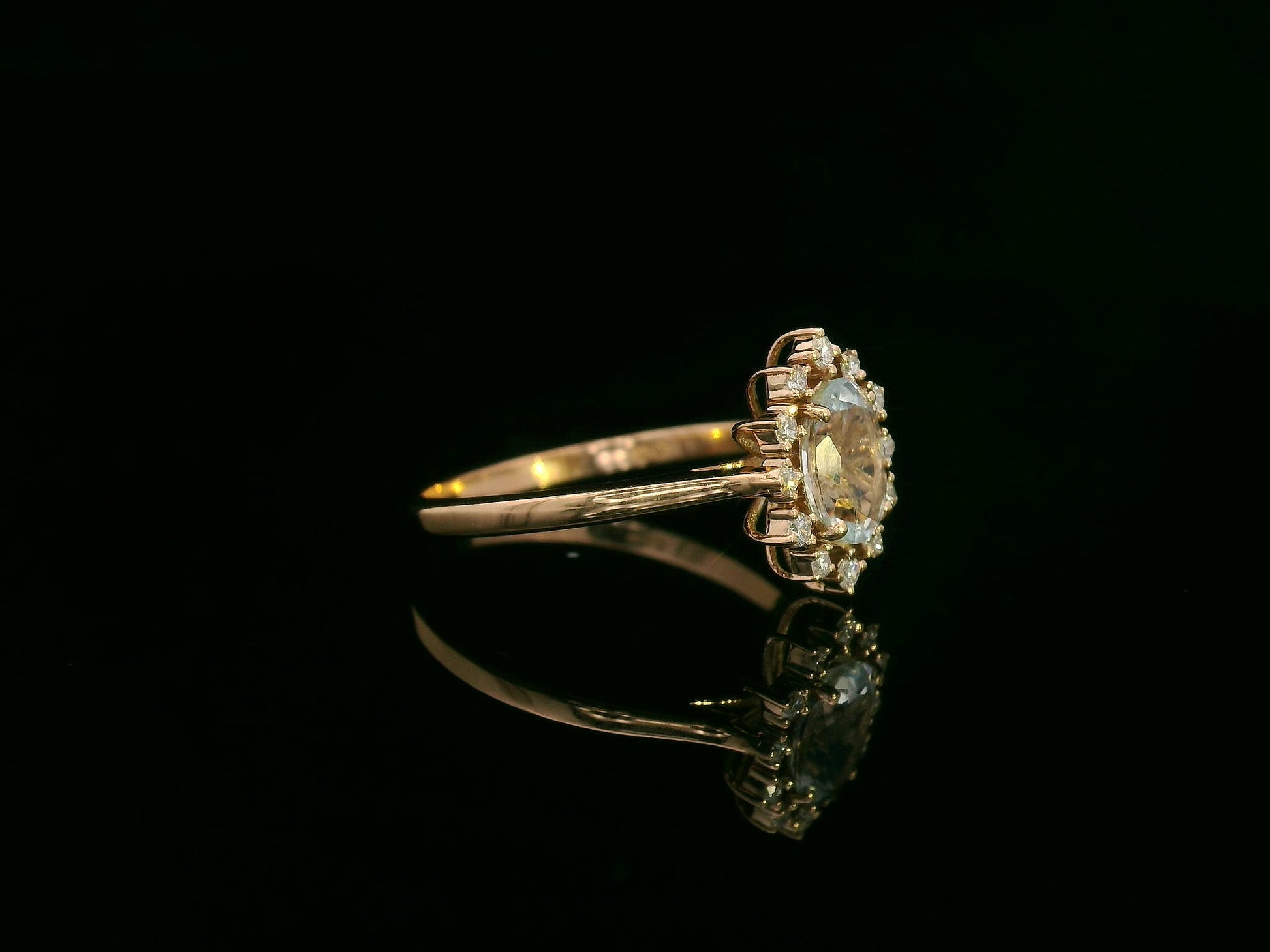 0.71 ct aquamarine and diamond halo ring in 18K rose gold with floral vintage-inspired design 