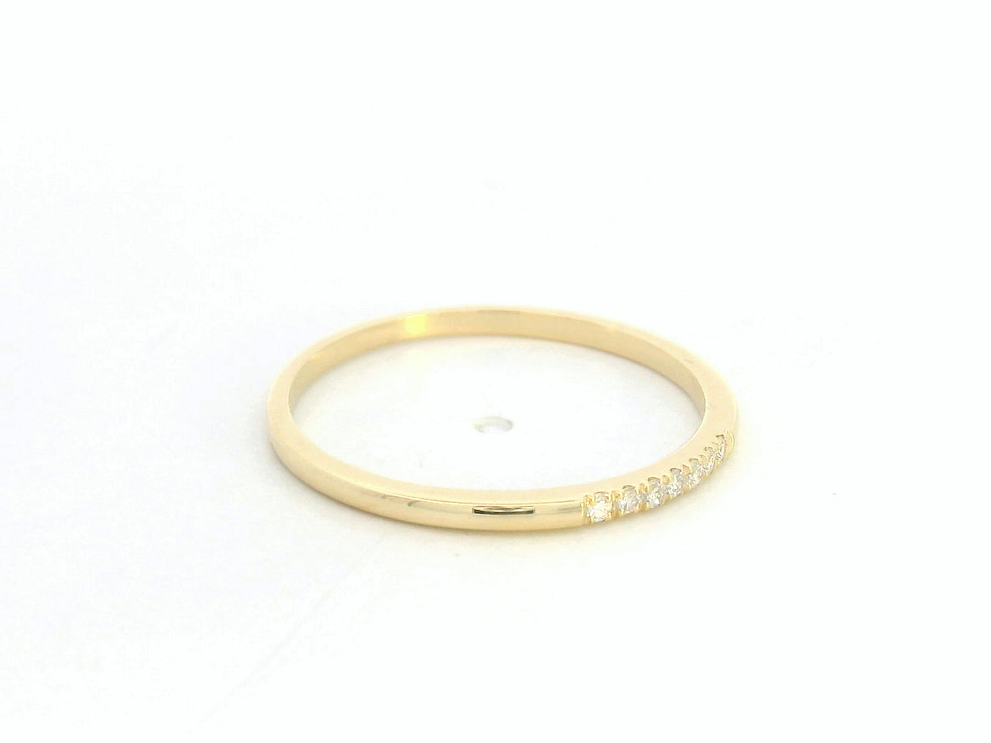 Dainty diamond stacking ring in 18K yellow gold by Emirates Diamonds