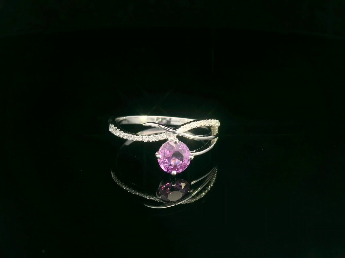 Pink sapphire and diamond bypass ring in 18K white gold by Emirates Diamonds
