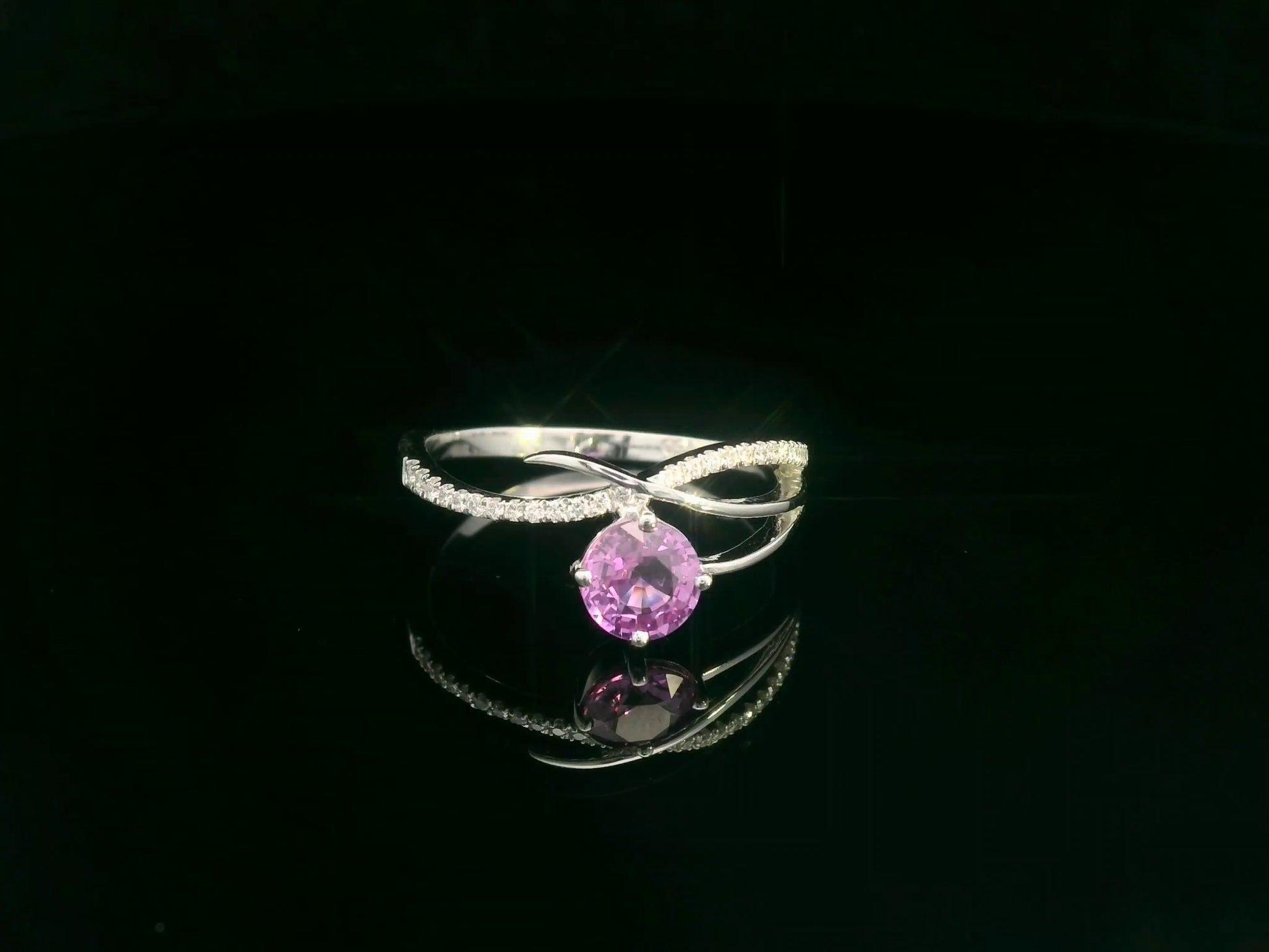 Pink sapphire and diamond bypass ring in 18K white gold by Emirates Diamonds