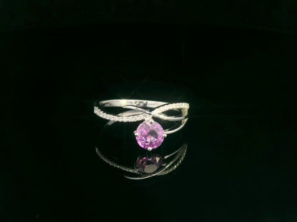 Pink sapphire and diamond bypass ring in 18K white gold by Emirates Diamonds