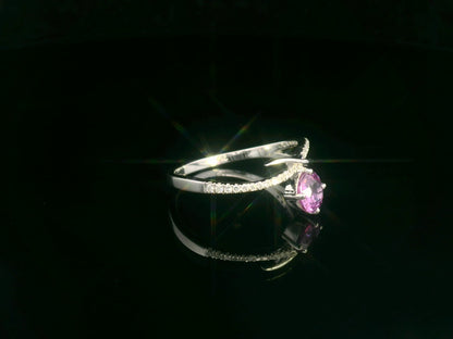 Pink sapphire and diamond bypass ring in 18K white gold by Emirates Diamonds