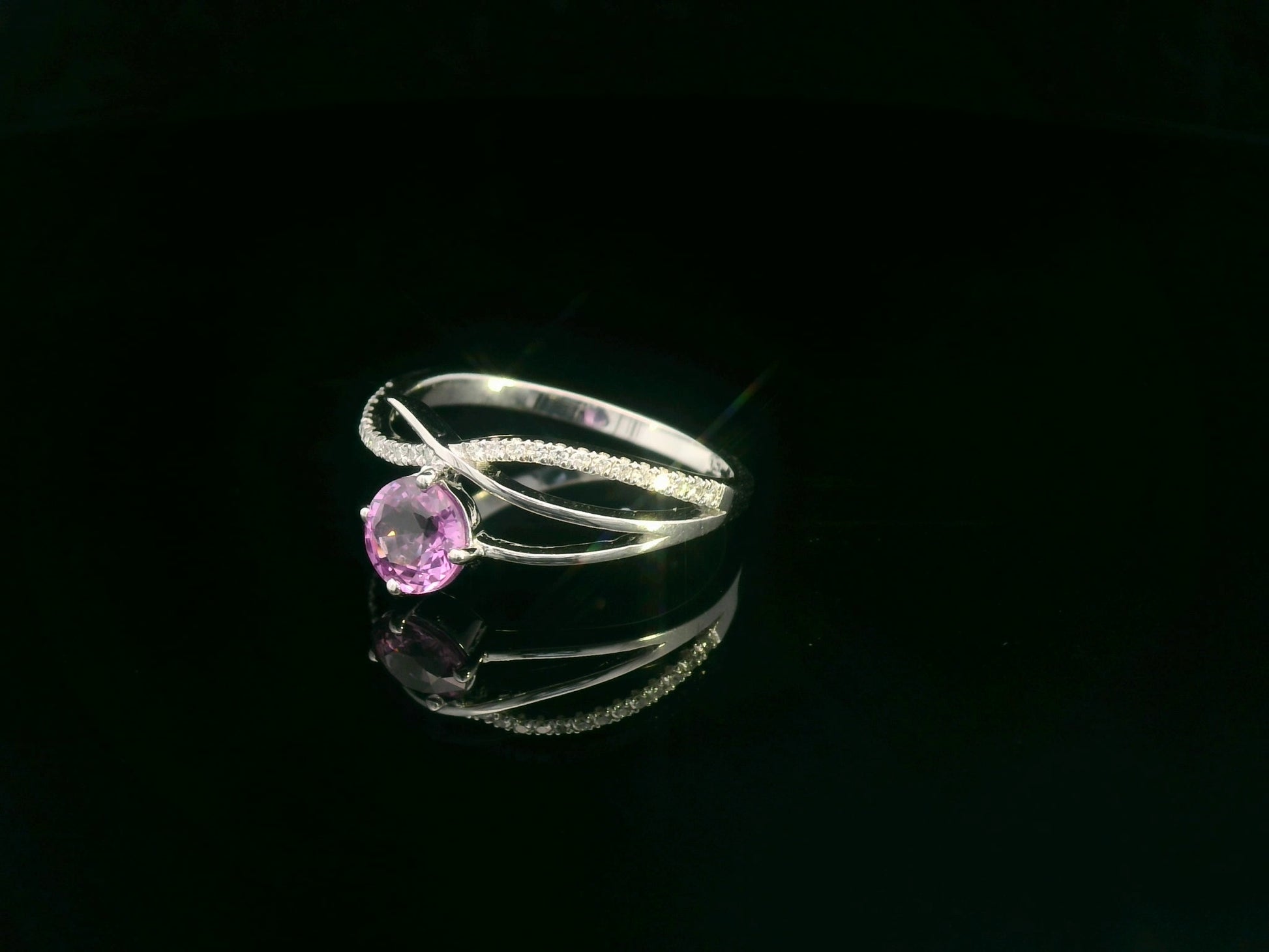 Pink sapphire and diamond bypass ring in 18K white gold by Emirates Diamonds