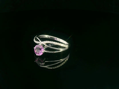 Pink sapphire and diamond bypass ring in 18K white gold by Emirates Diamonds