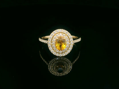 Oval yellow sapphire ring, 0.80 carat with 0.42 carat diamonds, 18K yellow gold, luxury statement ring by Emirates Diamonds