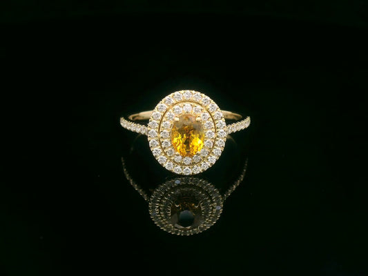 Oval yellow sapphire ring, 0.80 carat with 0.42 carat diamonds, 18K yellow gold, luxury statement ring by Emirates Diamonds