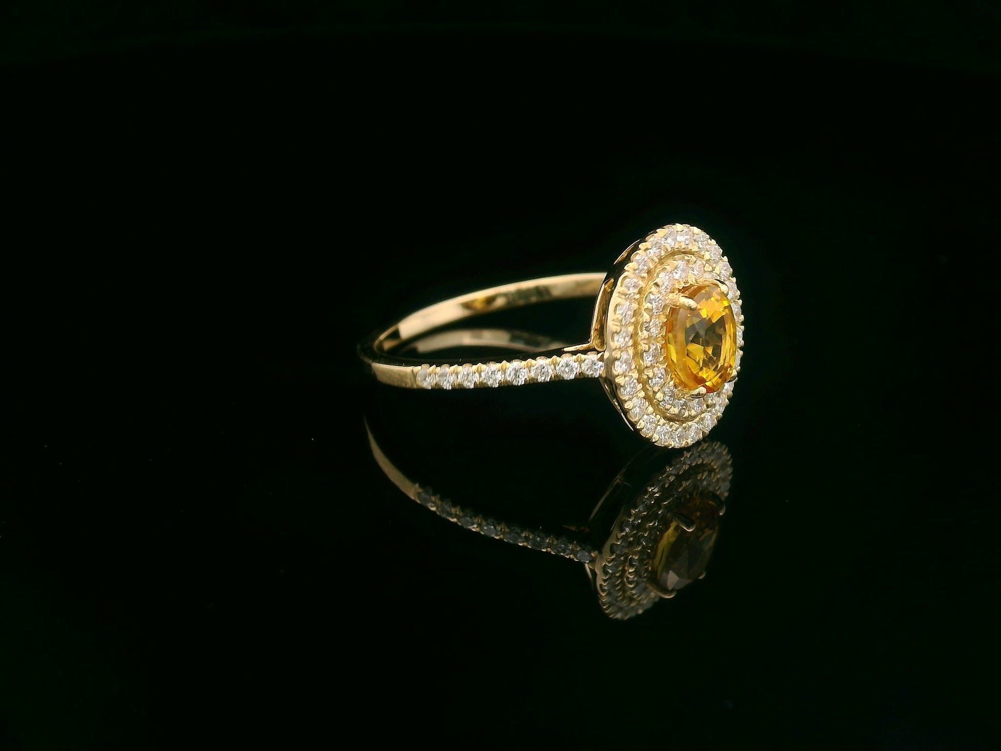 Oval yellow sapphire ring, 0.80 carat with 0.42 carat diamonds, 18K yellow gold, luxury statement ring by Emirates Diamonds