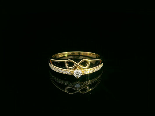 18K yellow gold infinity diamond ring with 0.19 carat solitaire – Emirates Diamonds
