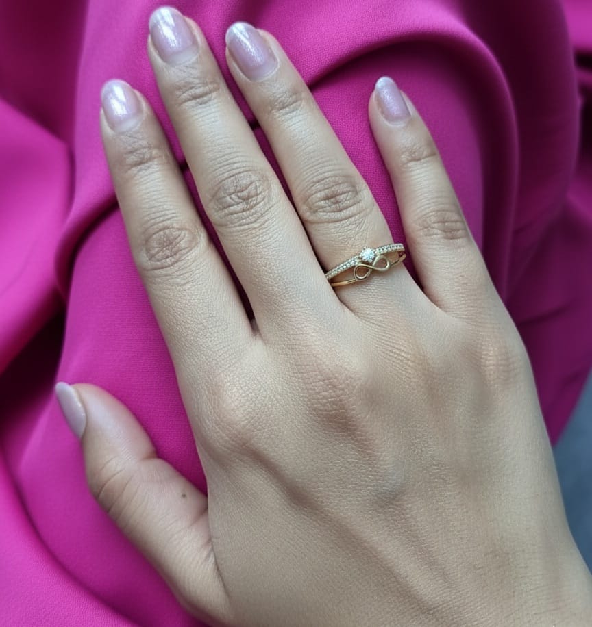 18K yellow gold infinity diamond ring with 0.19 carat solitaire – Emirates Diamonds