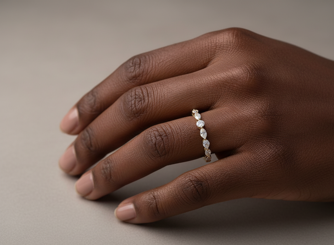 18K yellow gold diamond band featuring alternating marquise and round diamonds – elegant stackable fine jewelry by Emirates Diamonds.