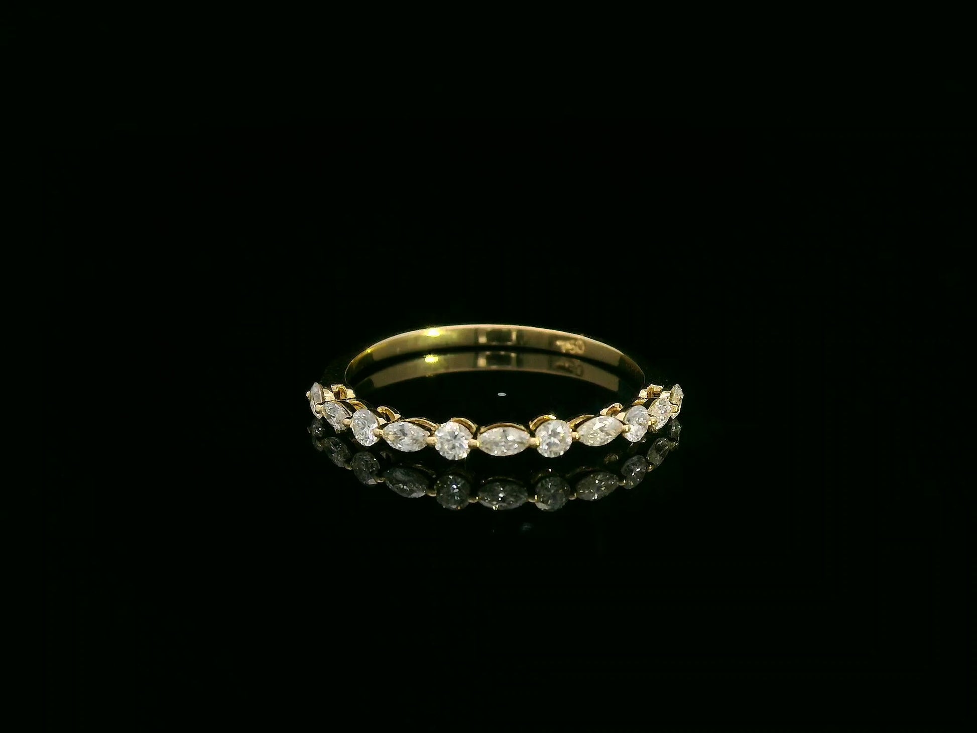 18K yellow gold diamond band featuring alternating marquise and round diamonds – elegant stackable fine jewelry by Emirates Diamonds.