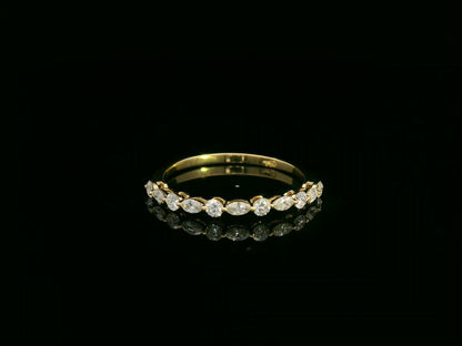 18K yellow gold diamond band featuring alternating marquise and round diamonds – elegant stackable fine jewelry by Emirates Diamonds.