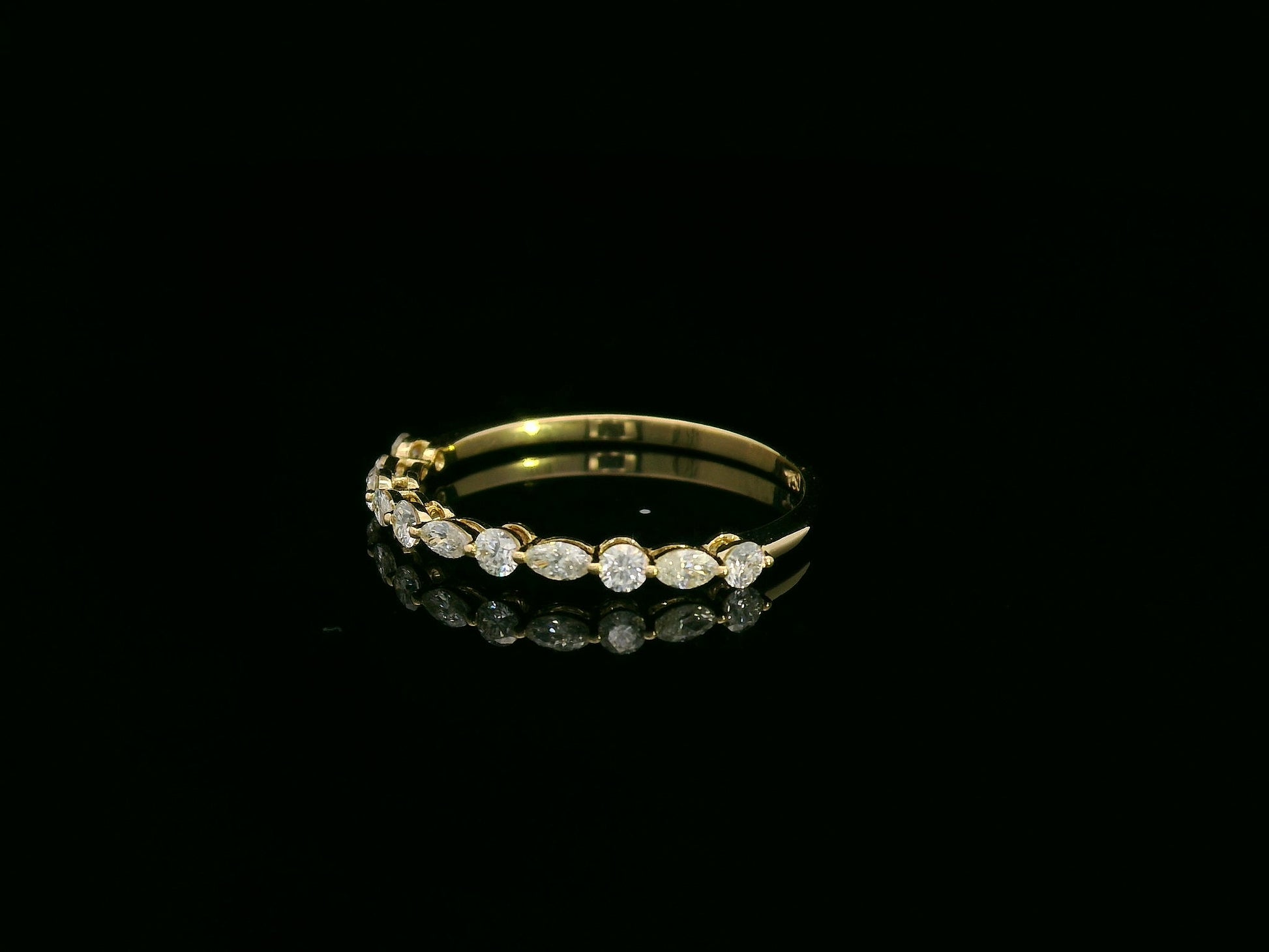 18K yellow gold diamond band featuring alternating marquise and round diamonds – elegant stackable fine jewelry by Emirates Diamonds.