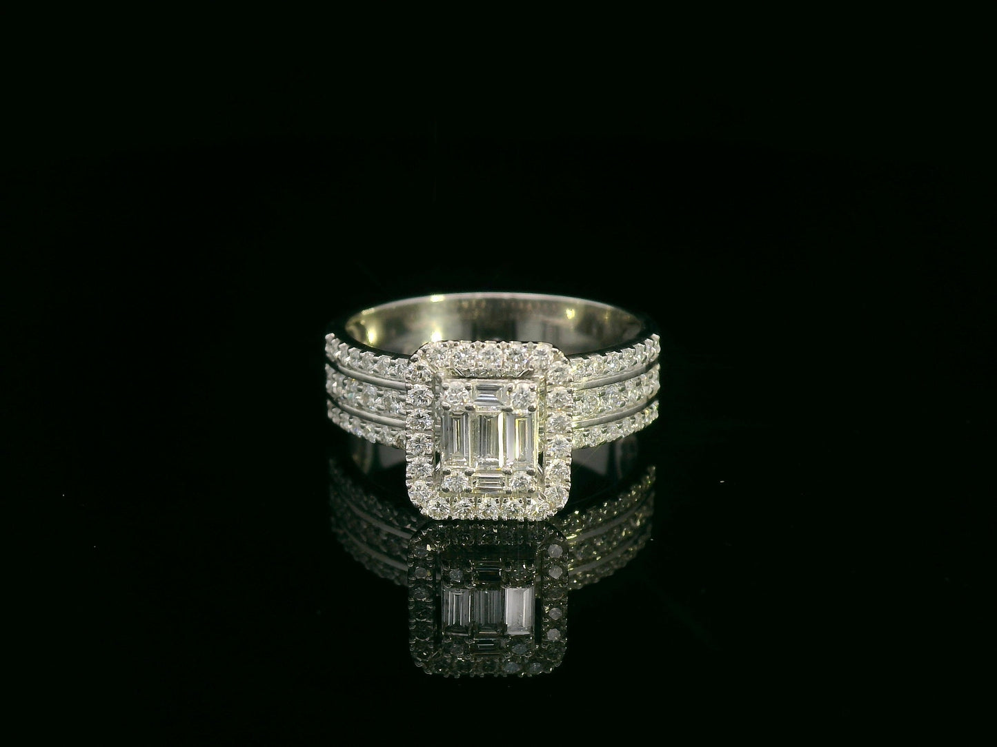 18K white gold bridal ring set with baguette and round diamond cluster – 1.28 carat by Emirates Diamonds.