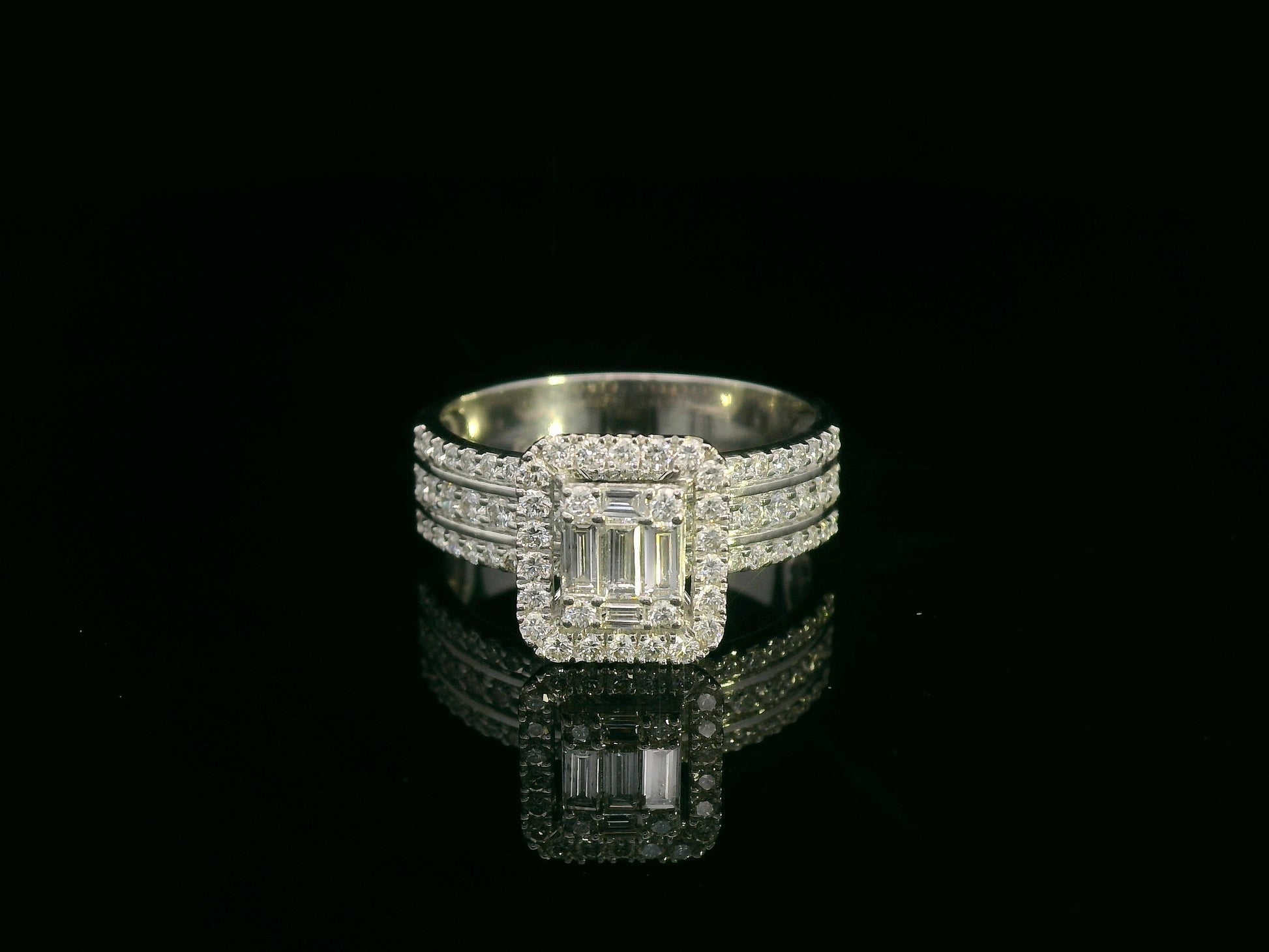 18K white gold bridal ring set with baguette and round diamond cluster – 1.28 carat by Emirates Diamonds.