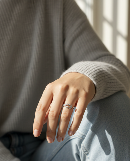 18K white gold diamond knot ring with pavé-set diamonds – minimalist symbolic jewelry by Emirates Diamonds