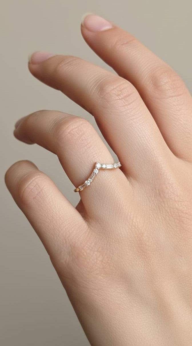 18K yellow gold diamond chevron ring with round and baguette diamonds – 0.27ct contour band by Emirates Diamonds.