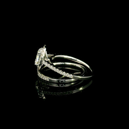 Oval diamond bridal set in 18K white gold with GIA certified natural diamond halo engagement ring and matching diamond wedding band