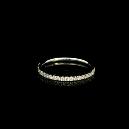 Oval diamond bridal set in 18K white gold with GIA certified natural diamond halo engagement ring and matching diamond wedding band