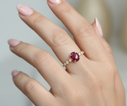 18K yellow gold ring with 1.66ct cabochon ruby and 0.10ct diamond accents – Emirates Diamonds.