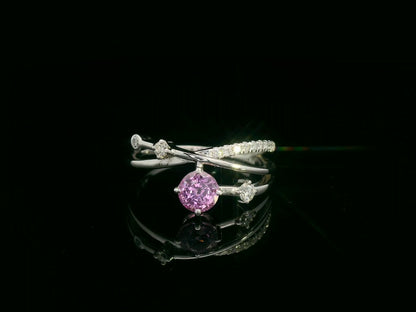 18K white gold bypass ring with 0.76ct round pink sapphire and 0.19ct diamond accents – Emirates Diamonds