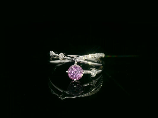 18K white gold bypass ring with 0.76ct round pink sapphire and 0.19ct diamond accents – Emirates Diamonds