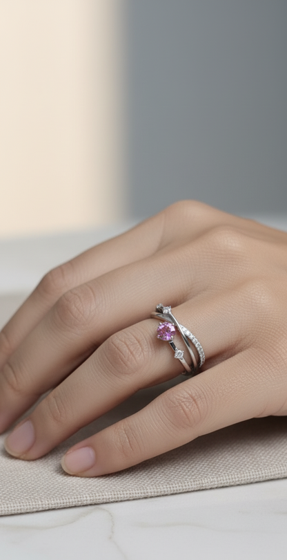 18K white gold bypass ring with 0.76ct round pink sapphire and 0.19ct diamond accents – Emirates Diamonds