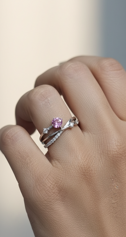 18K white gold bypass ring with 0.76ct round pink sapphire and 0.19ct diamond accents – Emirates Diamonds