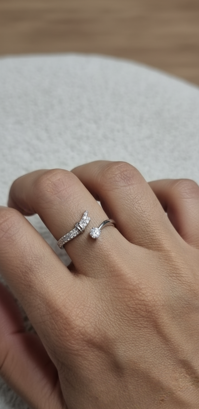 18K white gold diamond bypass ring with round center diamond and pavé side band – Emirates Diamonds