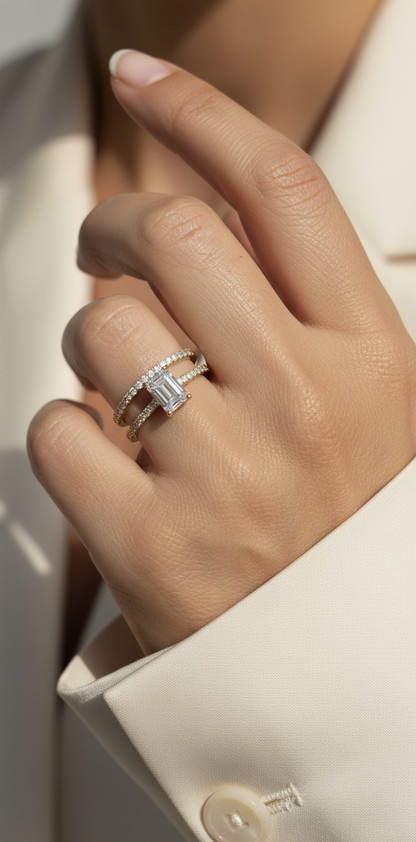 Emerald-cut diamond engagement ring and pavé wedding band bridal set in 18K yellow gold – Emirates Diamonds.