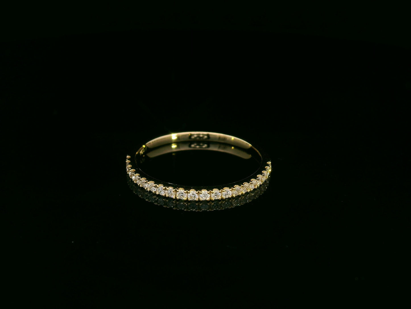 Emerald-cut diamond engagement ring and pavé wedding band bridal set in 18K yellow gold – Emirates Diamonds.