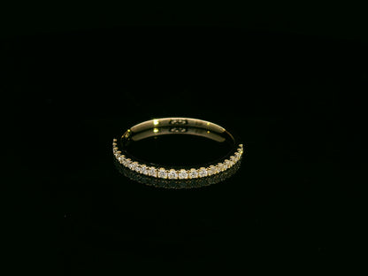 Emerald-cut diamond engagement ring and pavé wedding band bridal set in 18K yellow gold – Emirates Diamonds.