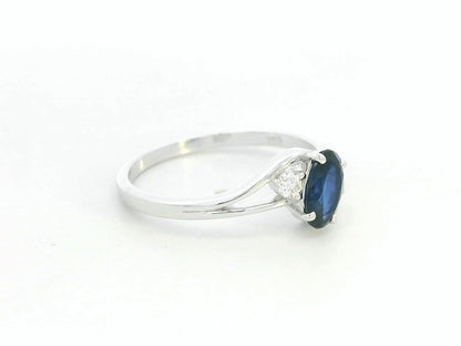 18K white gold sapphire and diamond ring – 0.84ct oval sapphire three-stone design by Emirates Diamonds