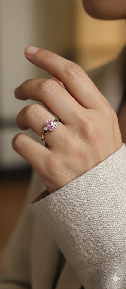 18K white gold ring with 0.81ct oval pink sapphire and diamond accents – Emirates Diamonds.