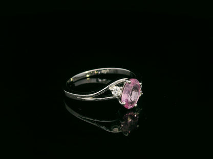 18K white gold ring with 0.81ct oval pink sapphire and diamond accents – Emirates Diamonds.