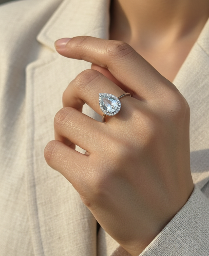 18K white gold pear-cut aquamarine halo ring – 2.38ct aquamarine with 0.23ct diamonds, elegant fine jewelry by Emirates Diamonds