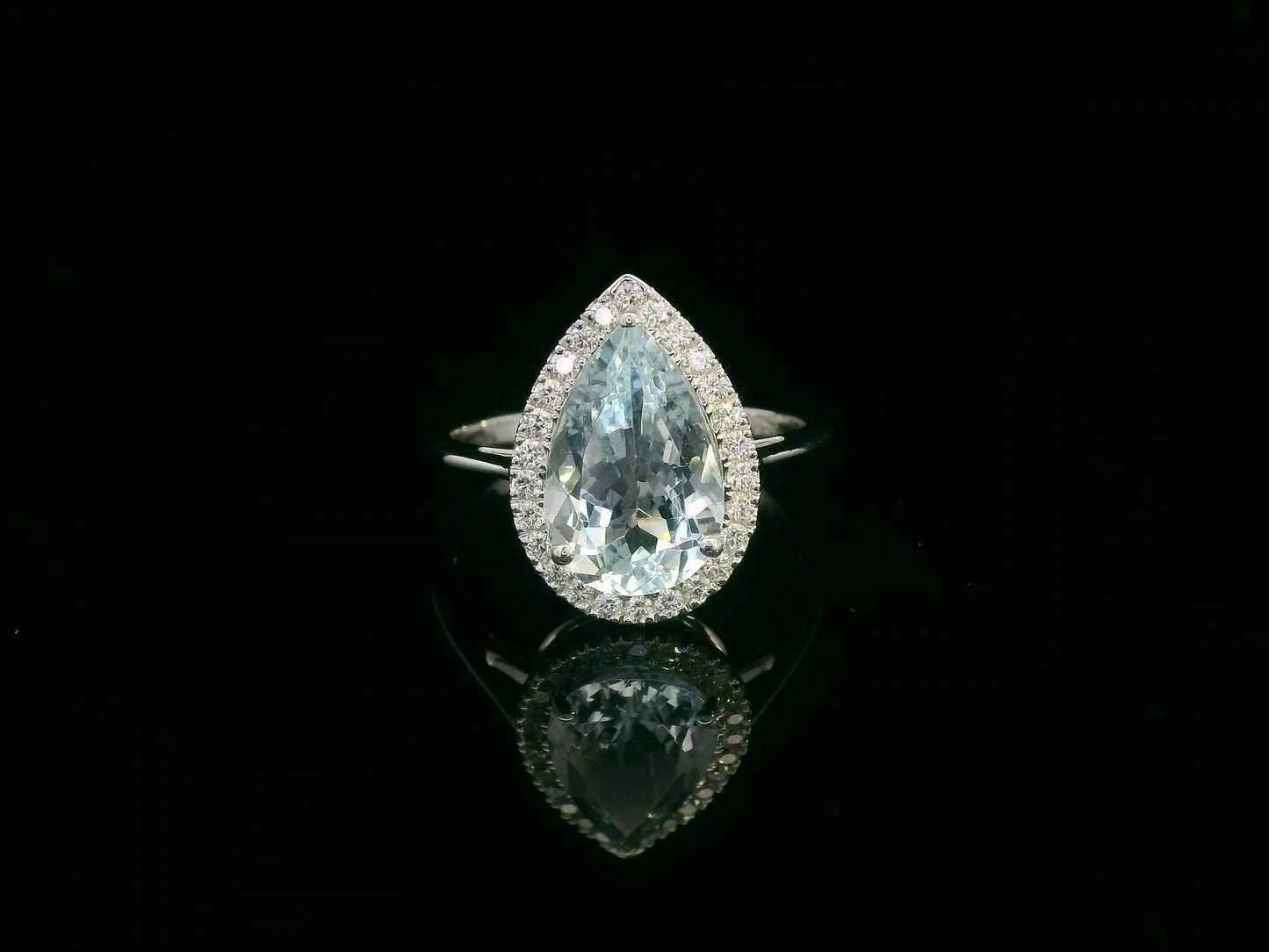 18K white gold pear-cut aquamarine halo ring – 2.38ct aquamarine with 0.23ct diamonds, elegant fine jewelry by Emirates Diamonds