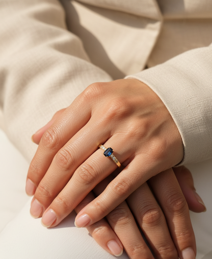 18K yellow gold emerald-cut blue sapphire and diamond ring – 0.46ct sapphire, 0.23ct diamonds by Emirates Diamonds