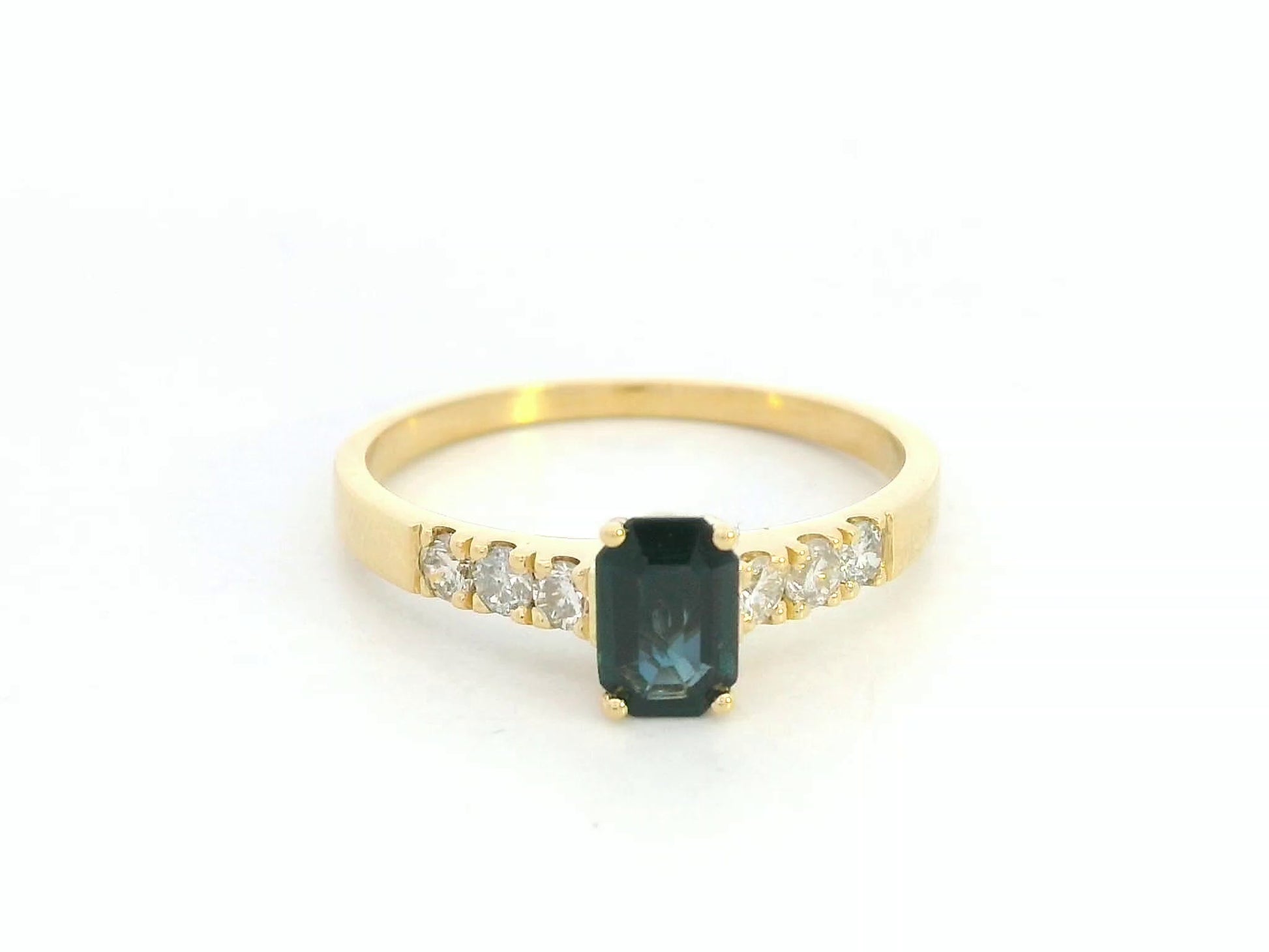 18K yellow gold emerald-cut blue sapphire and diamond ring – 0.46ct sapphire, 0.23ct diamonds by Emirates Diamonds